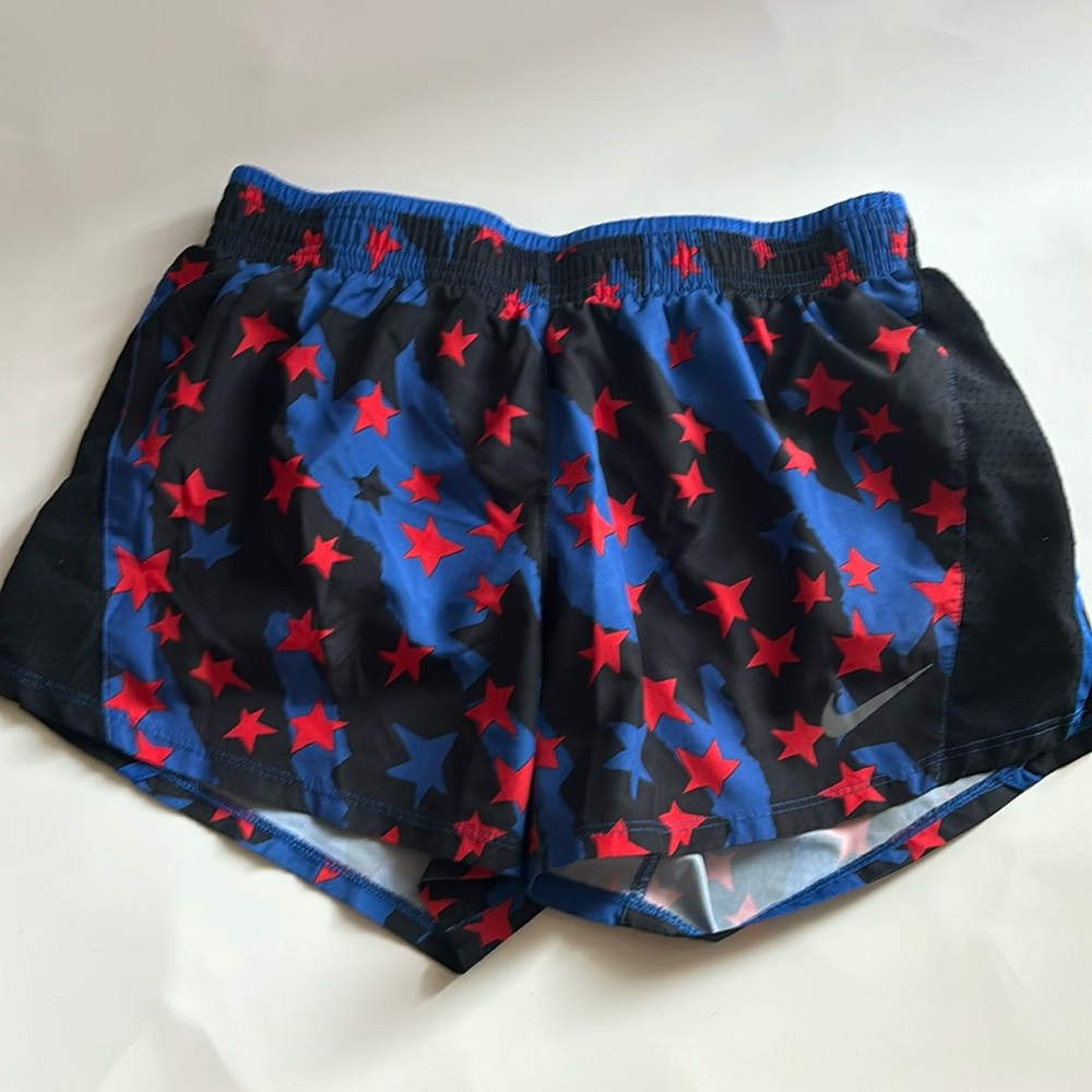 nike red, black, and blue star shorts